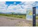 Picturesque Meadowlark Trail entrance with scenic mountain views and informational signage at 272 Lafayette St, Louisville, CO 80027