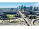 Aerial panorama captures the downtown skyline and the sports stadium, highlighting the convenience and amenities of urban living at 1019 26Th St, Denver, CO 80205