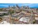 Aerial view featuring colorful murals and solar panels amid a bustling cityscape, illustrating a progressive community at 1019 26Th St, Denver, CO 80205