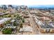 An urban aerial view showcasing neighborhood's proximity to downtown, surrounded by diverse architectural styles and city amenities at 1019 26Th St, Denver, CO 80205