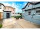 Charming backyard with patio seating area and vibrant green lawn at 1019 26Th St, Denver, CO 80205
