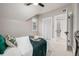 Inviting bedroom showcasing natural light and a view to an ensuite bathroom at 1019 26Th St, Denver, CO 80205