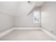 Cozy bedroom with natural light, neutral tones, and carpeted floor at 1019 26Th St, Denver, CO 80205