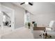 Bedroom with office space including a window, desk, and an office chair at 1019 26Th St, Denver, CO 80205