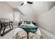 Bedroom featuring a comfortable bed, ceiling fan, and natural light at 1019 26Th St, Denver, CO 80205