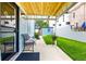 Relax on the bench on the front porch; a perfect spot for enjoying the beautifully landscaped yard at 1019 26Th St, Denver, CO 80205
