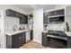 Modern kitchen features stainless steel appliances, stylish tile backsplash, and elegant marble countertops at 1019 26Th St, Denver, CO 80205