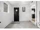 Mud Room provides entrance to the kitchen from a large black door at 1019 26Th St, Denver, CO 80205