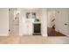 Basement wet bar with wine cooler, perfect for entertaining at 66 Charlou Cir, Cherry Hills Village, CO 80111
