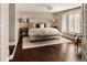 Spacious bedroom with hardwood floors and large windows at 66 Charlou Cir, Cherry Hills Village, CO 80111