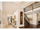 Bright and spacious entryway with high ceilings and hardwood floors at 66 Charlou Cir, Cherry Hills Village, CO 80111