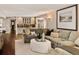 Spacious Gathering room with comfortable sectional sofa and built-in bar at 66 Charlou Cir, Cherry Hills Village, CO 80111
