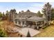 Luxury home with large backyard, patio, and built-in grill at 66 Charlou Cir, Cherry Hills Village, CO 80111