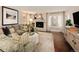 Living room with fireplace and comfortable seating area at 66 Charlou Cir, Cherry Hills Village, CO 80111