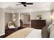 Main bedroom with access to another room and a dresser at 66 Charlou Cir, Cherry Hills Village, CO 80111