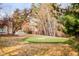 Landscaped backyard with a private putting green at 66 Charlou Cir, Cherry Hills Village, CO 80111