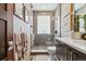 Modern bathroom featuring glass shower, tile accents, and neutral color scheme creating a spa-like retreat at 3219 Castle Butte Dr, Castle Rock, CO 80109