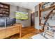 Office space featuring beautiful wood floors, shelving and a large monitor at 3219 Castle Butte Dr, Castle Rock, CO 80109