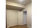 Bedroom features white closet doors and wood-look flooring at 4580 W Alameda Ave, Denver, CO 80219