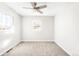 Bright bedroom featuring neutral walls and carpet at 185 S Eliot St, Denver, CO 80219