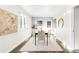 Formal dining room with hardwood floors and seating for six at 185 S Eliot St, Denver, CO 80219