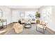 Bright and airy living room featuring a neutral color palette and modern furniture at 185 S Eliot St, Denver, CO 80219