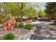 Community featuring garages, mature trees, well-maintained grounds, and ample parking at 8095 Garrison Ct # B, Arvada, CO 80005