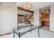 Bright and airy dining room showing open floorplan and stairs at 8095 Garrison Ct # B, Arvada, CO 80005