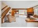 Open living space with stairs and fireplace at 8095 Garrison Ct # B, Arvada, CO 80005