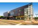 Exterior view of a modern building with large glass windows and contemporary architectural design at 7604 Reed St, Arvada, CO 80003