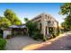Exterior view of a restaurant, featuring a outdoor patio area and a nicely landscaped facade at 7604 Reed St, Arvada, CO 80003