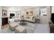 Finished basement Gathering room with comfortable seating and large TV at 1224 Sugarloaf Ln, Erie, CO 80516