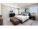 Spacious main bedroom with large windows and plenty of natural light at 1224 Sugarloaf Ln, Erie, CO 80516