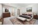 Main bedroom with ensuite bathroom and stylish furnishings at 1224 Sugarloaf Ln, Erie, CO 80516