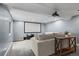 Basement living area with projector screen and comfortable seating at 8051 W 78Th Cir, Arvada, CO 80005