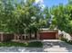 Charming two-story home with brick and siding, mature trees, and a two car garage at 8051 W 78Th Cir, Arvada, CO 80005