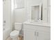 Bright, modern bathroom featuring a white vanity, mirror, toilet and bathtub with tiled wall at 552 Red Rock Pl, Brighton, CO 80601