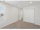 Bright bedroom with window, carpet, sliding closet doors, and recessed lighting at 552 Red Rock Pl, Brighton, CO 80601