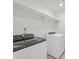 Modern laundry room featuring washer and dryer at 552 Red Rock Pl, Brighton, CO 80601
