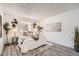 Serene bedroom featuring soft lighting, stylish decor, and a comfortable bed at 10211 Ura Ln # 7-204, Thornton, CO 80260