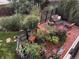 Inviting backyard featuring a patio with an outdoor seating area surrounded by lush landscaping at 11918 S Hitching Post Trl, Parker, CO 80134