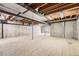 Spacious unfinished basement with exposed ceiling at 18225 E Caley Dr, Aurora, CO 80016