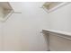 Bright closet offering ample storage space with wall-mounted bars for optimal organization at 2 Larkdale Dr, Littleton, CO 80123