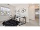 Cozy sitting area with natural light, stylish decor, and comfortable seating, perfect for relaxing at 5983 Fulton St, Denver, CO 80238