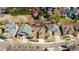 An aerial view of homes with mature trees, landscaping, and private yards in a suburban neighborhood at 6378 Noble Ct, Arvada, CO 80403