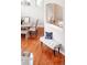 Inviting entryway with stylish bench seating and hardwood floors at 6378 Noble Ct, Arvada, CO 80403