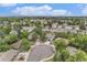 An aerial view shows this neighborhood's homes, tree-lined streets, cul-de-sac and close proximity to Denver's downtown area at 2743 S Reading Ct, Denver, CO 80231