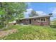 Spacious backyard, brick house, and patio at 2743 S Reading Ct, Denver, CO 80231