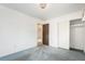 Bedroom featuring carpeting and a large closet at 2743 S Reading Ct, Denver, CO 80231