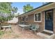 Brick patio furnished with tables and chairs at 2743 S Reading Ct, Denver, CO 80231